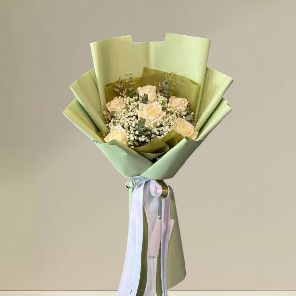 ช่อดอกไม้ (White rose) กุหลาบสีขาว ห่อกระดาษโทนเขียว